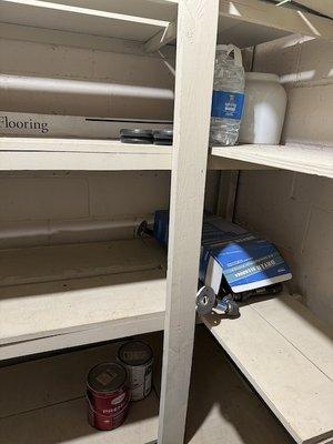 Shelves with remaining items that they claimed to have emptied, wiped, and treated