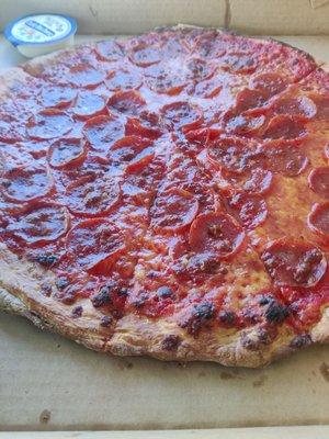 Larg thin crust pizza, with extra pepperoni and sweet sauce