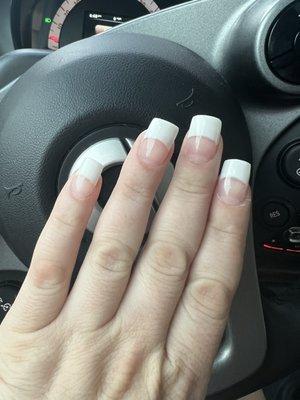 White plastic tips. Uneven and not at all like my reference photos.