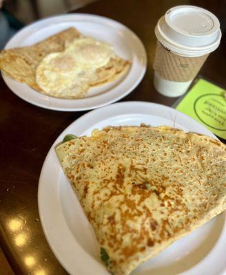 Mushrooms, Spinach and Caramelized Onions and Scrambled Egg Crepe, Chai Tea Latte, and Bacon & Cheddar with Two Eggs on Top