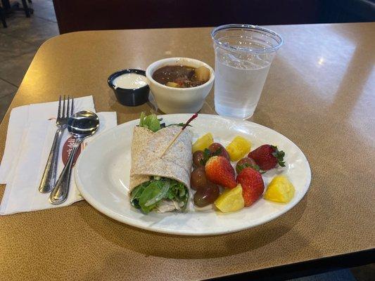 Managers Manager's 1/2 Specialty Sandwich turkey wrap with beef stew and fruit.