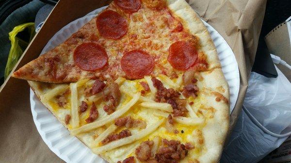 A slice of pepperoni and a slice of cheddar cheese, bacon and fries.