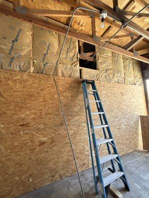 Framed wall and added insulation