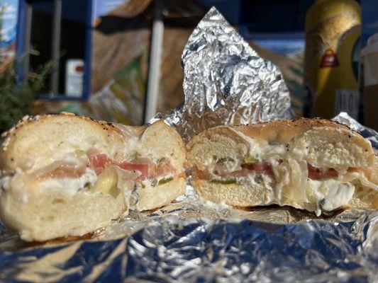 Crystal with the works on an everything bagel and jalapeño cream cheese