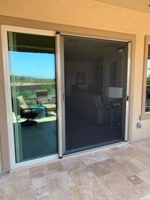 Retractable screen on patio slider