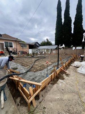 Right before pouring concrete for the foundation of an ADU!