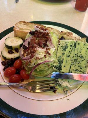 Cajun chicken and wedge salad with a giant piece of bleu cheese