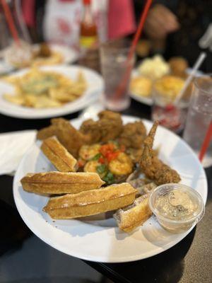 The Sampler - Chicken wings, sweet potato waffle, petite shrimp & grits