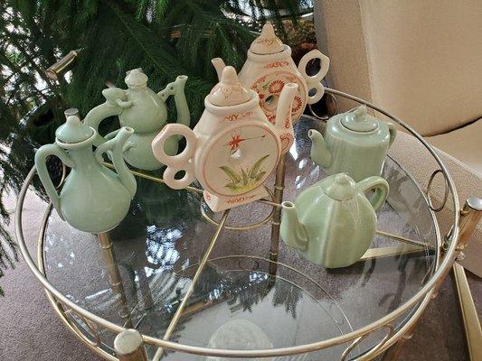 A collection of ceramic teapots