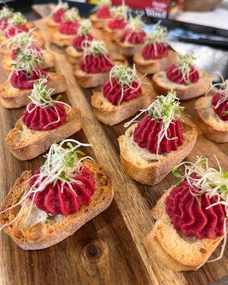 Beet Hummus on Crostini! A crowd favorite by L.A. Paella Catering