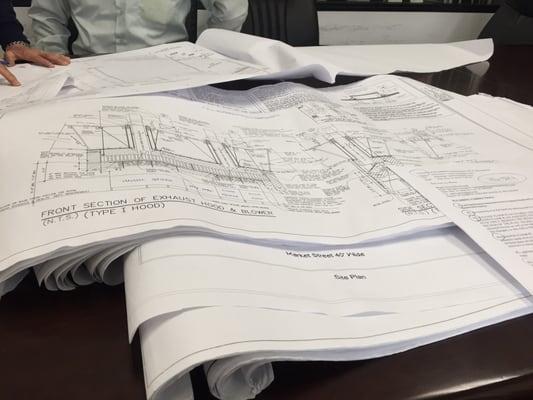 Lots of blueprints (engineering) for Poke Shack at Melrose.