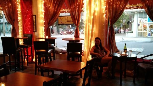 view of the tables along the window, adorable twinkly lights, and me, because my mom insisted...