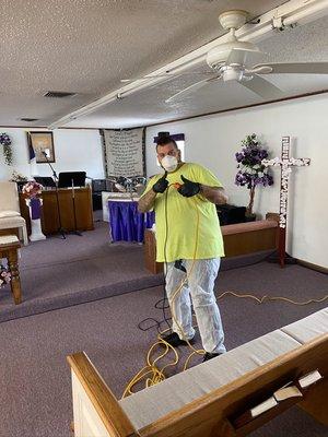 At work disinfecting a church