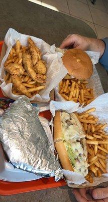 Cheesesteak, chicken sandwich, Small Hummus and Chicken Tenders!! Yum!!