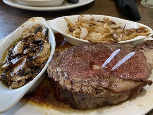 Prime Rib with mushrooms and fried onions.