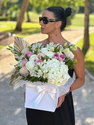 Monroe - floral arrangement in the square box consists of roses, tulips, ranunculuses, hydrangea, alstroemeria, lisianthus, greens.