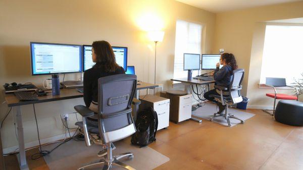 Two of our amazing team members working in our Ballard offices.