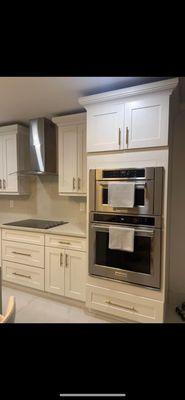 Double oven cabinet, and cooktop with glass hood