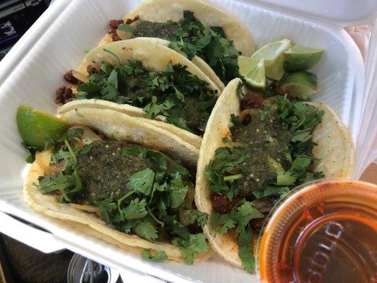 Two al pastor and two carne asada tacos w/ salsa picante