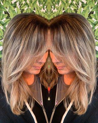 Hand painted balayage root retouch and blow out .