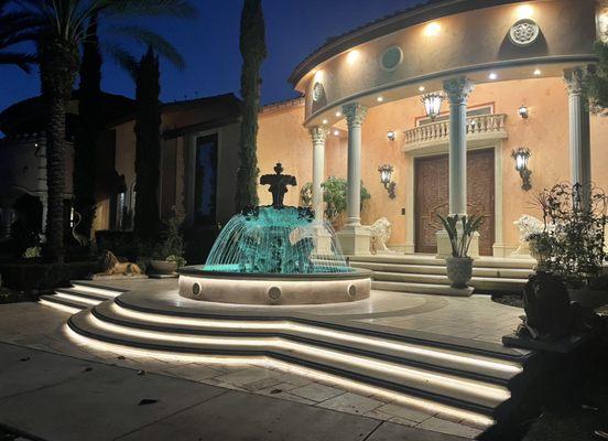 Custom built fountain with LED color changing lights, bullnose steps and rope lighting