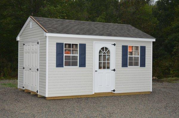 12X16 vinyl cottage with optional 11 lite door.