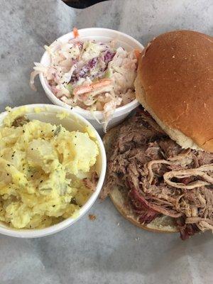 Bbq pork sandwich. Potato salad and Cole slaw