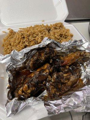 Jerk chicken with rice and peas