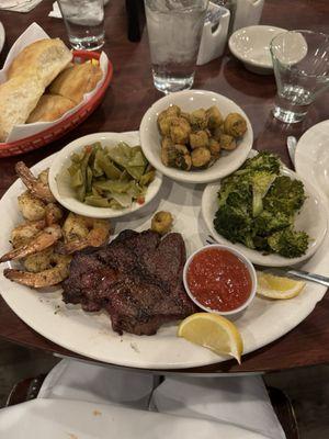 Ny strip , 5 jumbo shrimp, green beans and broccoli. Delicious