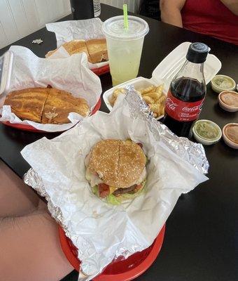 Hamburger, birria torta, torta cubana, and agua de limon