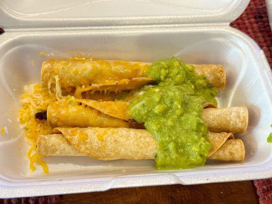 Three Taquitos with cheese and guacamole. A little thin on cheese and guacamole but Taquitos are very meaty and crispy.