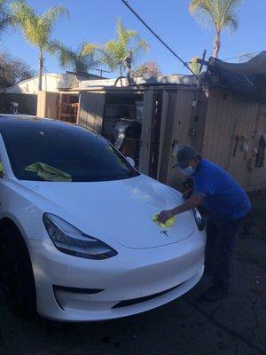 Hand wax being applied