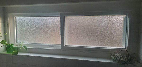 Beautiful new bathroom window from the inside looking out. This is the privacy glass option.