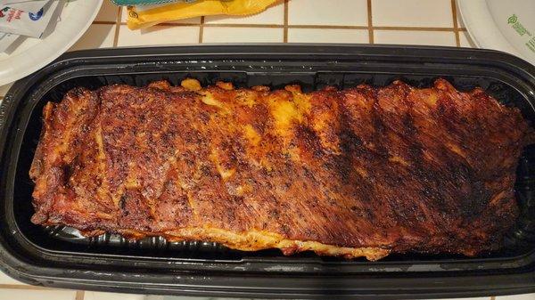 St Louis style ribs next to the rotisserie chicken.