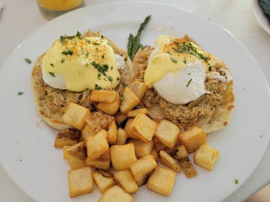 Benedict Oscar with home fries and asparagus