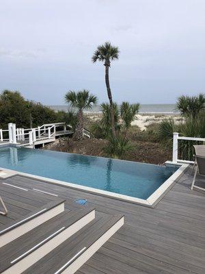 The infinity pool overlooking the beach.