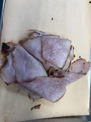 Thinly sliced smoked in-house Ham. Get it on a dinner or a sandwich! Delicious!!