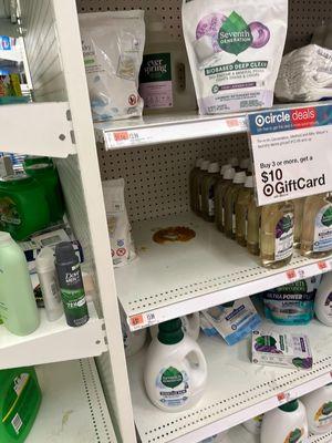 Brown liquid on shelf