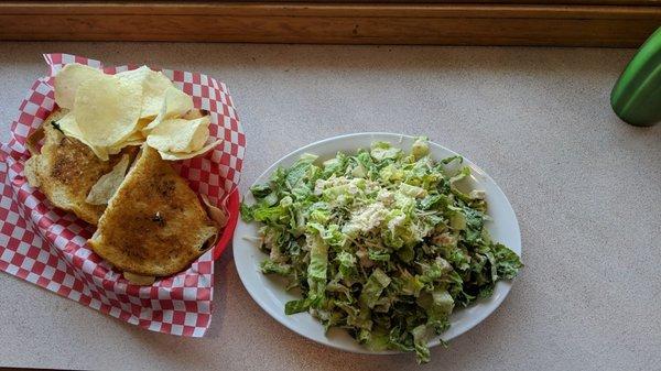 Turkey Reuben sandwich; chicken Caesar salad