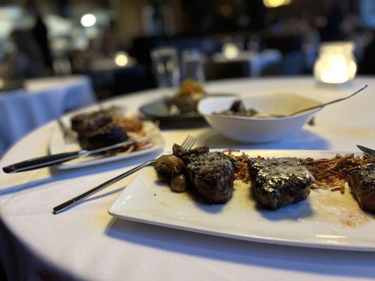 Flight of Filets, hassleback potatoes, mushrooms and shallots.