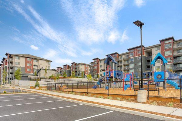 parking lot, playground and buildings