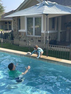 Daddy teaching his girls to do a cannonball!!!!