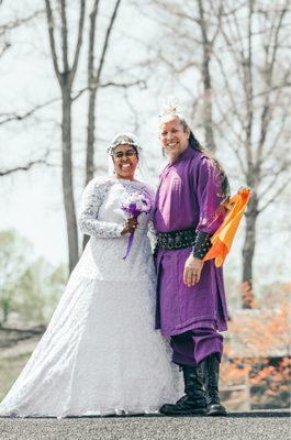 My husband and I after we say I do. Look at my dress. Love it.