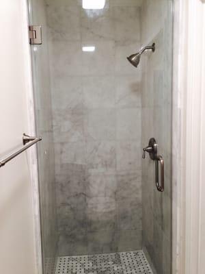 Carrera marble shower with glass & new fixtures