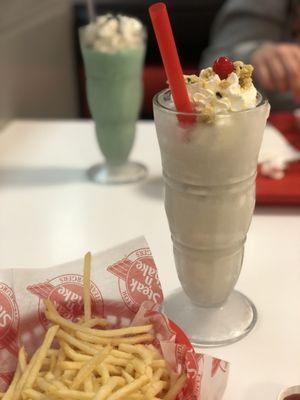 Fries, chocolate chip cookie dough milkshake, mint Oreo milkshake