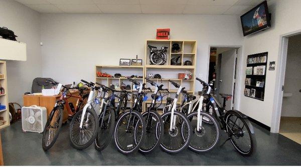 Kapolei shop and some commuter Ebikes, can you spot the Brompton?