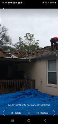 Tarps are always placed around the house on clean up magnets are dragged all around the house to pick up any nails.