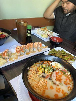 Spicy tonkatsu, salmon tempura and tiger Roll sushi.