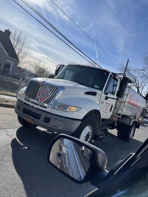 Truck blocking the entire two way street.