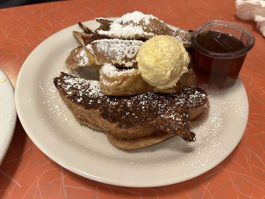 excuse my husband's napkin next to this scrumptious platter of french toast.